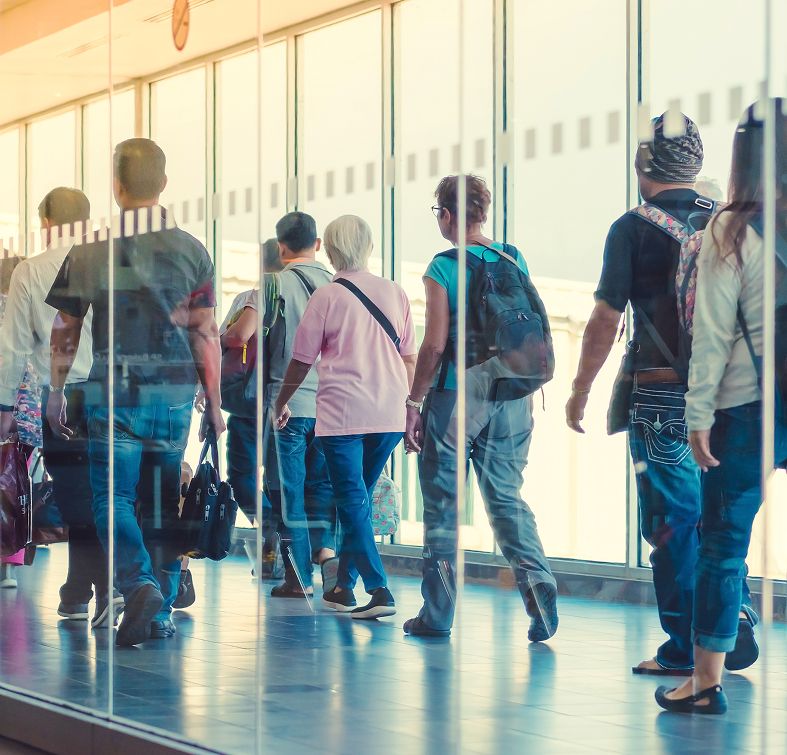 Group of people boarding a plane